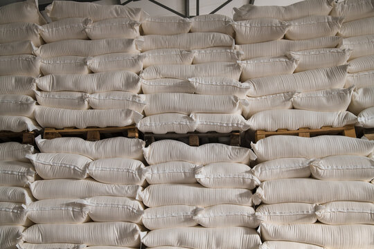 Food warehouse. Bags of rice, sugar, flour and other products.