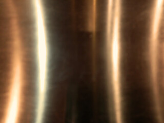 Silver stainless steel wall surface reflecting the camera flash light