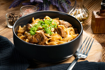 Tagliatelle mosse with beef sauce.
