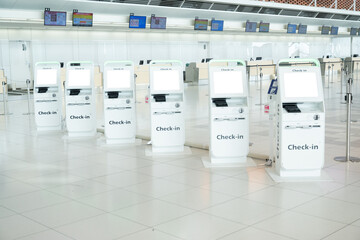 Airport check-in kiosk in the airport, travel concept