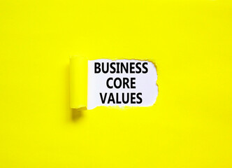 Business core values symbol. Concept words Business core values on beautiful white paper. Beautiful yellow background. Business motivational business core values concept. Copy space.