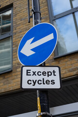 one way except for bicycles sign