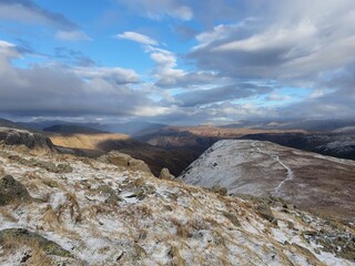views over the snowy mountains in the lake District, England