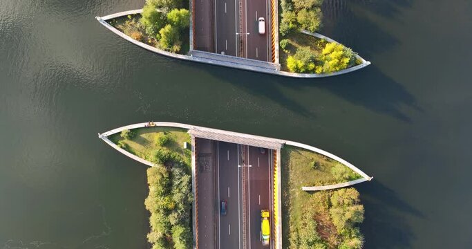 Aquaduct Veluwemeer, Netherlands. Video background. Transportation and roads. Aerial view. Industrial landscape from a drone. View from above.