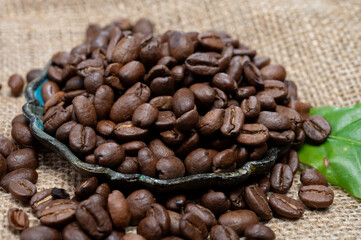 Arabica brown roasted coffee beans from Africa coffee producing region, cultivating in Ethiopia, Ivory Coast, Uganda, Kenya, Rwanda and Tanzania