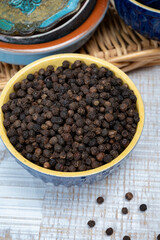 Indian spices collection, dried black peppercorns, kitchen spices
