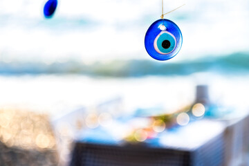 Fototapeta na wymiar Evil eye bead in the Turkey beach.