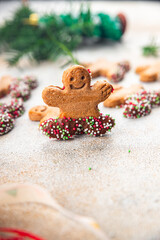 gingerbread man christmas cookie cinnamon, vanilla, ginger christmas sweet dessert holiday baking treat new year meal food snack on the table copy space food background