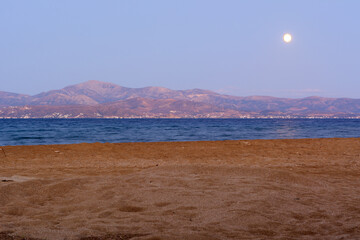 Logaras beach on Paros island. View of the Naxos coast. Cyclades, Greece