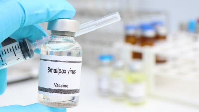 smallpox virus vaccine in a vial, immunization and treatment of infection, scientific experiment