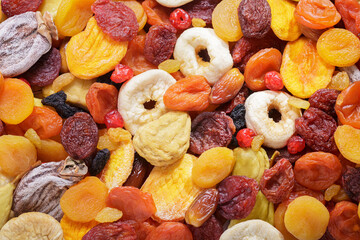mixed of dried fruits as background - obrazy, fototapety, plakaty