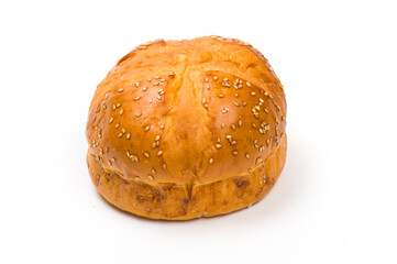 Close-up image of a  kaiser roll sprinkled with sesame seeds, isolated on white