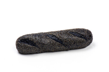 Close-up image of a black sub roll naturally colored with activated charcoal sprinkled with poppy seeds, isolated on white background