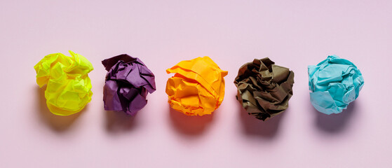 Crumpled Colorful Paper Balls on Pink Background, Creative Idea and Inspiration Concept