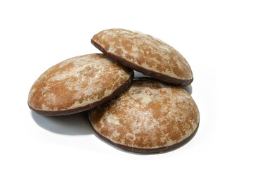 Mini lebkuchen pastries, isolated on a white background. German food concept.