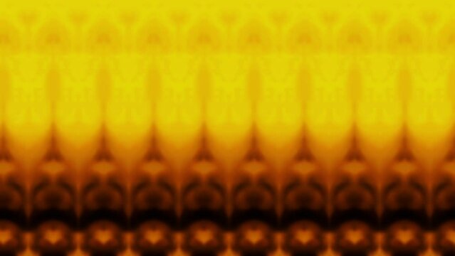 Yellow pattern liquid animated with different shades on the dark background. Blurred texture of yellow fluid. Not AI.