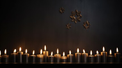 burning candles and the Star of David against on a dark gray background wall. Yom HaShoah
