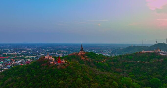 .aerial view The rays of the sun shine on the top of the castle. .The rays of the sunset pierced through the palace. .amazing cloud in bright sky at sunset above the palace on hilltop.