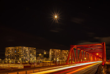 road bridge and modern residential skyscrapers in Gdansk Letnica at night