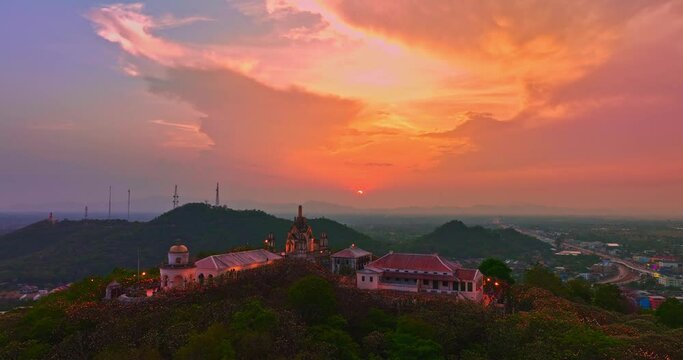.Aerial view Huge, brightly colored clouds curled into a spiral above the castle..amazing cloud in bright sky at sunset above the palace on hilltop.Phetchaburi city background. cityscape background