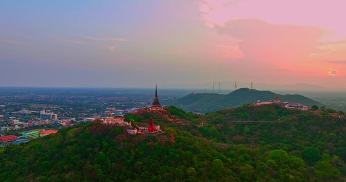 .aerial view The rays of the sun shine on the top of the castle. .The rays of the sunset pierced through the palace. .amazing cloud in bright sky at sunset above the palace on hilltop.