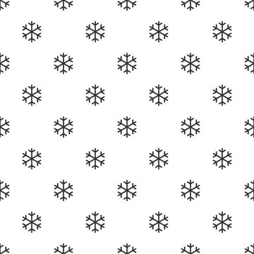 Snowflakes on a white background, seamless pattern. New Year party background.