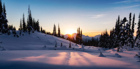 Winter Landscape in Canadian Mountain Landscape. Colorful Sunset.