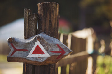 Tourist track mark. Sign of beginning of green trail. Arrow wooden track blank road sign. The...
