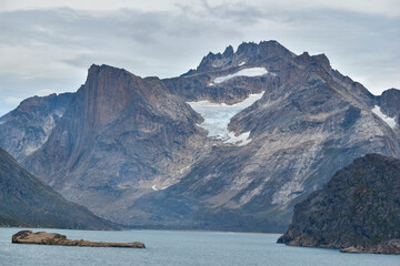 Remains of glaciers rest high in the mountains around Prince Christian Sound, Greenland. © Don Masten II