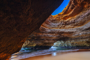 Benagil cave algarve portugal - abstract background and travel concept