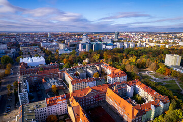 Szczecin from a bird's eye view on a sunny day. View of the city from the Oder River. City buildings, the seaport in Szczecin and its most characteristic places.