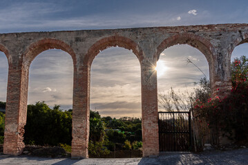 Tablazo or iron water aqueduct in the town of Nerja in a dilapidated state, Malaga.