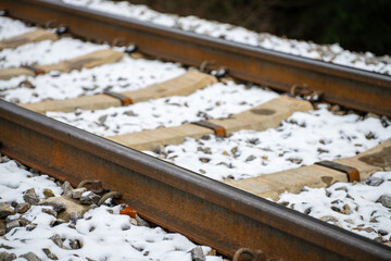 railway train track in the frost detail on the landscape background