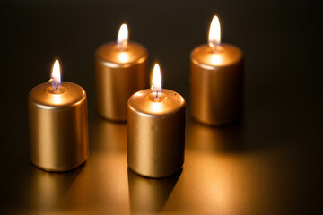 advent - Four golden Candles burning