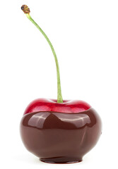 Fondue cherry in hot chocolate on a white background. Sweet cherry in liquid chocolate.