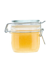 front view of small ginger jam jar without labels and shiny metallic lid covers isolated on white background.