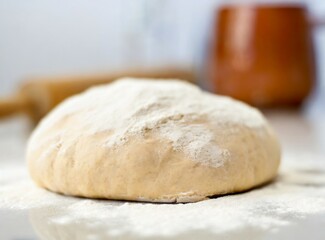 Fototapeta na wymiar Kneading Bread, Isolated bun and rolling pin