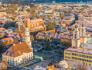 Aerial day time view of a wonderful and cozy Christmas town in Kaunas old town. Amazing Kaunas 2024 Christmas tree located in the city hall square