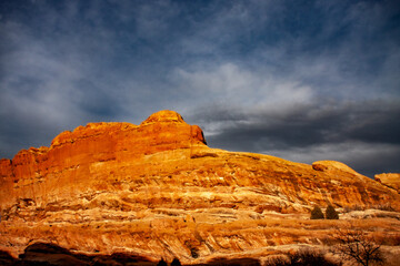 Radiant Sunset Over Morrison, CO: Brilliant Illumination on Red Rocks