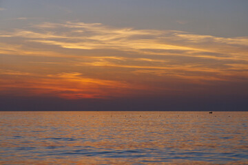 Incredible color of the sea and sky at sunset.