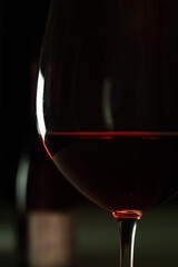 Vertical closeup of a cup of red wine