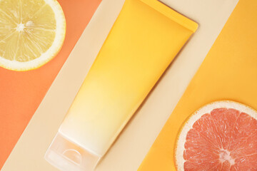 skin care product with citrus composition on an orange background