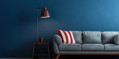 cozy corner with a sofa and lamp, an American flag adding a patriotic touch against a backdrop of classic blue walls