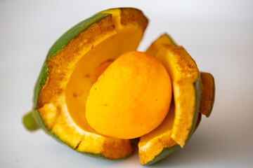 Typical ripe pequi fruit (caryocar brasiliense) in fine details and selective focus. Typical fruit from the Brazilian cerrado bioama.