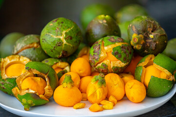 Typical ripe pequi fruit (caryocar brasiliense) in fine details and selective focus. Typical fruit from the Brazilian cerrado bioama.