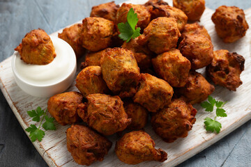 Fried fragrant Crispy Onion bhaji, vegetarian, vegan Indian party food