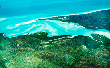 Fototapeta na wymiar Aerial view of part of the Hill Inlet in Whitsunday Island near Great Barrier Reef, The reef is located in the Coral Sea, off the coast of Queensland, Australia. Dec 2019