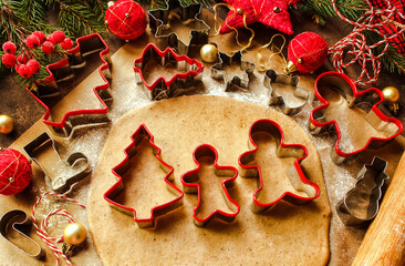 The concept of a baking background with Christmas cookie dishes and Christmas decorations. Christmas or New Year background.