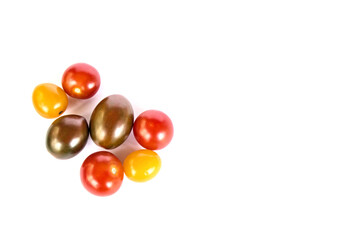 multi colored cherry tomatoes isolated on white background (cut out colorful grape tomato, many colors, multicolor) food, fruit, vegetable, vegetarian, diet, cuisine, vegan, green, yellow, red berries