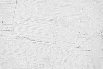 Vintage, old stucco plaster surface background, close up grunge texture of white painted cement, concrete wall texture. Wallpaper, backdrop, architecture design element